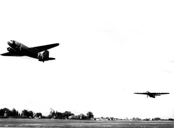 Reinforcement for U.S. paratroopers in Normandy, June 1944 A C-47 transport towing a glider load of U.S. airborne infantry takes off from a 9th U.S. Air Force Troop Carrier Command station in England to support of Allied paratroopers dropped behind enemy line in Normandy (France) June 6, 1944. Copyright: xPhoto12 Coll-DITE USISx DIT01103_255