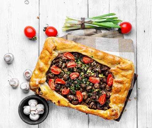 Delicious meat pie stuffed with mushrooms and tomato , 24017994.jpg, meat, pie, dinner, food, meal, mushrooms, tomato cuisine, homemade, pastry, vegetable, delicious, traditional, lunch, beef, golden, rustic, crust, tomato, table, nutritious, dough, cake, stuffing, tasty, whole, bake,