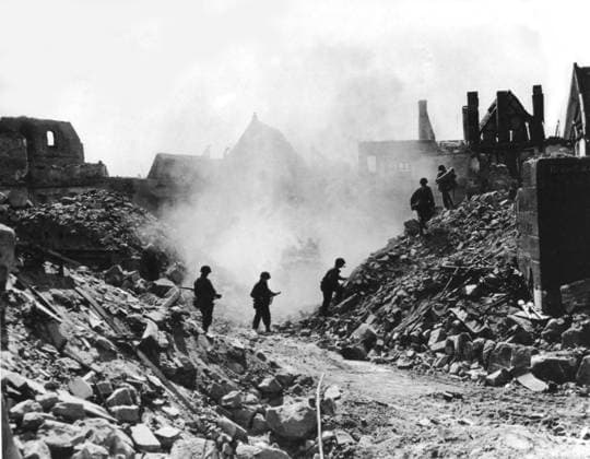 American infantrymen hunt out snipers in Nuremberg April 20, 1945 Troops of the 3rd Infantry Division, 7th U.S. Army, search through the rubble of bombed buildings in Nuremberg as a tankdozer, in the background, clears a path through the debris (April 20, 1945). Copyright: xPhoto12 Coll-DITE USISx DIT01138_120