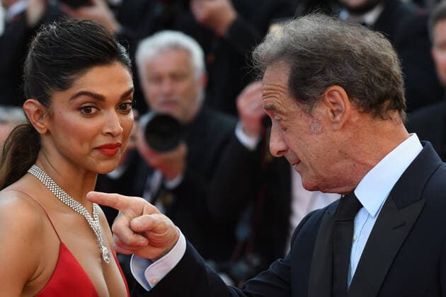 75th Cannes Film Festival 2022, red carpet Armageddon Time. Pictured: Deepika Padukone, Vincent Lindon  Copyright: xManuelexMangiarottix xipa-agencyx xVeneziax2020x