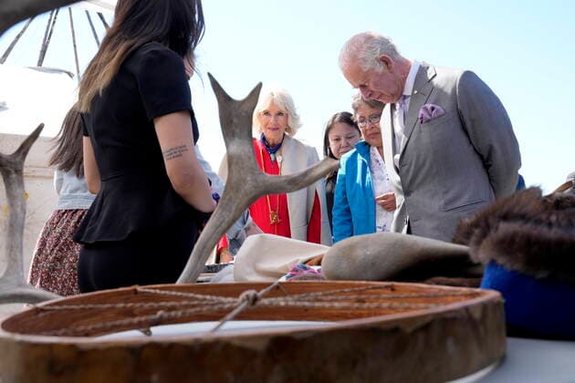 May 19, 2022, Yellowknife, NT, CANADA: Prince Charles, second from right, and Camilla, Duchess of Cornwall, centre, look at a display of traditional hunting tools and clothing after arriving in Yellowknife, Northwest Territories, during part of the Royal Tour of Canada, Thursday, May 19, 2022. Yellowknife CANADA - ZUMAc35_ 20220519_zaf_c35_076 Copyright: xPaulxChiassonx