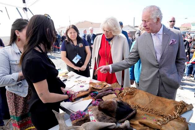 May 19, 2022, Yellowknife, NT, CANADA: Prince Charles, right, and Camilla, Duchess of Cornwall, second from right, look at a display of traditional hunting tools and clothing after arriving in Yellowknife, Northwest Territories, during part of the Royal Tour of Canada, Thursday, May 19, 2022. Yellowknife CANADA - ZUMAc35_ 20220519_zaf_c35_077 Copyright: xPaulxChiassonx