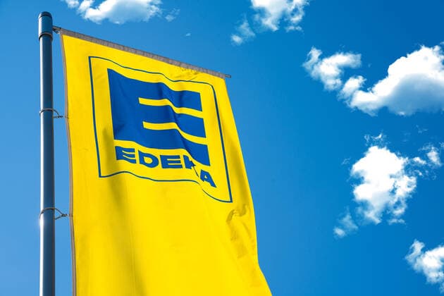 Gersthofen, Bavaria, Germany - 28 April 2022: Edeka German supermarket company logo advertising