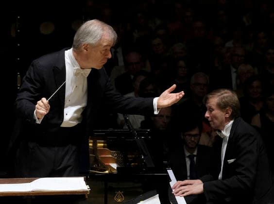 American conductor David Robertson, left, and Czech pianist Ivo Kahanek perform during the concert at the 77th Prague Spring international music festival in Prague, Czech Republic, May 20, 2022. (CTKxPhoto MichalxKrumphanzl) CTKPhotoP2022052008478  kru 7