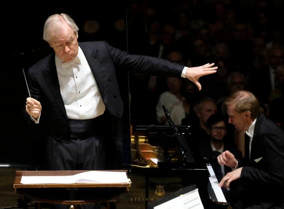 American conductor David Robertson, left, and Czech pianist Ivo Kahanek perform during the concert at the 77th Prague Spring international music festival in Prague, Czech Republic, May 20, 2022. (CTKxPhoto MichalxKrumphanzl) CTKPhotoP2022052008482  kru 6