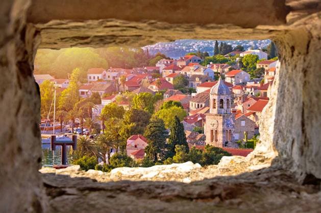 Town of Cavtat towers and waterfront view througf stone window, south Dalmatia, Croatia , 27139482.jpg, cavtat, dubrovnik, ragusa, unesco, world heritage, site, landmark, monumental, old, historic, architecture, croatia, dalmatia, mediterranean, building, monument, stone, rock, square, walkway, tower, croatian, dalmatian, coast, facade, konavle, travel, tourist, destination, hrvatska, coastline, sea, ocean, harbor, city, blue, mountain, beach, stronghold, strong, rooftops, south, turquoise, boat, waterfront,