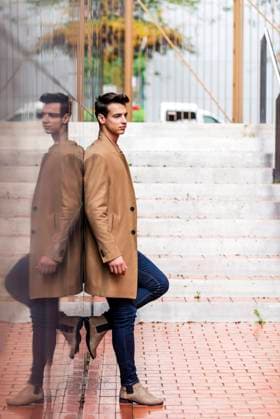 Side view of young stylish man leaning on black wall while looking away outdoors in sunny day, model released, , 33416750.jpg, Jacket, Male, Young, casual, fashionable, man, photo, looking away, trendy, side view, stylish, denim, clothes, leaning, standing, wall, outdoors, sunny, day, coat, scarf, one person, one, young man, daylight, guy, outside, city, urban, street, style, fashion, attractive, handsome, hairstyle, elegant, autumn, adult, clothing, confident, formalwear, good looking, modern, lifestyle, portrait, vertical
