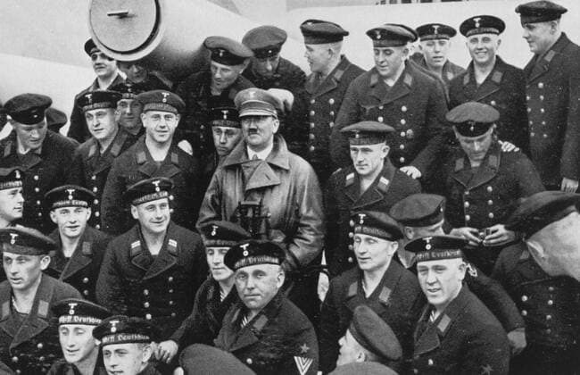 Hitler surrounded by a sailors unit, in Hamburg Adolf Hitler surrounded by a sailors unit, in the Hamburg harbour. 1935 Copyright: xPhoto12 CollectionxparticuliÃ¨rex HTL04112_131