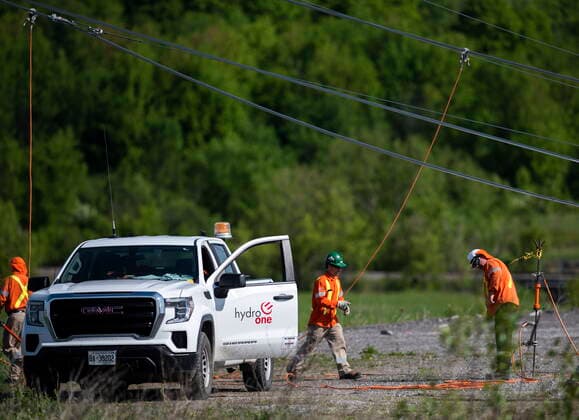 May 24, 2022, Ottawa, ON, CAN: Hydro One crews work along a hydro corridor where transmission towers were damaged, after SaturdayöÄÃ s major storm caused significant damage to the regionöÄÃ s power distribution network, in Ottawa, on Tuesday, May 24, 2022. Ottawa CAN  - ZUMAc35_ 20220524_zaf_c35_031 Copyright: xJustinxTangx