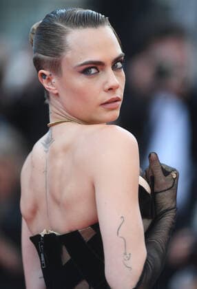 British model Cara Delevingne attends the premiere of The Innocent The 75th Anniversary Evening Gala at Palais des Festivals at the 75th Cannes Film Festival, France on Tuesday, May 24, 2022.  CAN20220524172 RUNExHELLESTAD