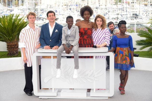 75th Cannes film festival 2022, Photocall film Tori and Lokita. Pictured: Tijmen Govaerts, Alban Ukaj, Pablo Schils, Joely Mbundu, Charlotte De Bruyne, Nadege Ouedraogo  Copyright: xAlbertoxTerenghi Cannesx2022x xix xVenezia2020x