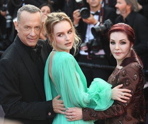Internationale Filmfestspiele von Cannes, Elvis Premiere American actor Tom Hanks, Australian actress Olivia De Jonge and actress Priscilla Presley attend the premiere of Elvis at Palais des Festivals at the 75th Cannes Film Festival, France on Wednesday, May 25, 2022.  CAN20220525127 RUNExHELLESTAD