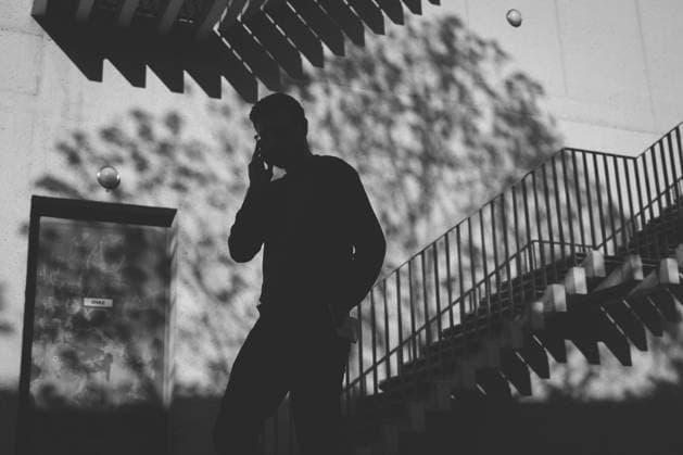 Streetphotography Cologne, 05 05 22 Streetphotography, Silhouette of a person talking on the phone
