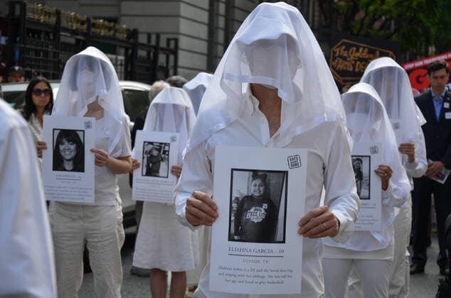 Bilder des Jahres 2022, News 05 Mai News Themen der Woche KW21 News Bilder des Tages Gays Against Guns Rally in NYC March participants are seen holding photos of deceased children and marching to Times Square, New York City to demand better gun laws and to ask everyone to come out as a gun violence prevention advocate on May 26, 2022. New York New York United States Copyright: RyanxRahman