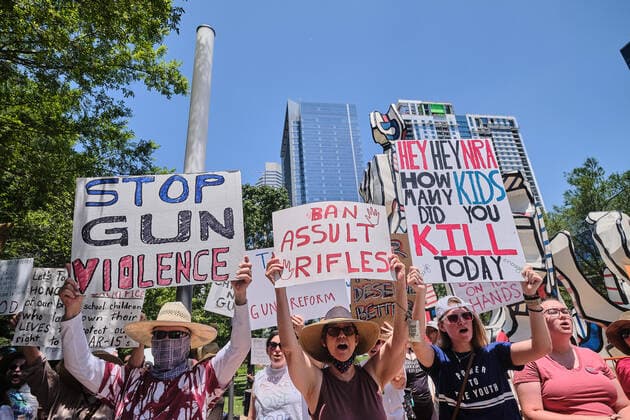 May 27, 2022, Houston, Texas, USA: Protesters gathers in Discovery Green, in DonÃ‚Â t look away demonstration in Houston to call for gun reform measures after the Uvalde, TX, shooting. Amid protests, NRA meets in Texas after school massacre. Houston USA - ZUMAe130 20220527_znp_e130_021 Copyright: xCarlosxEscalonax