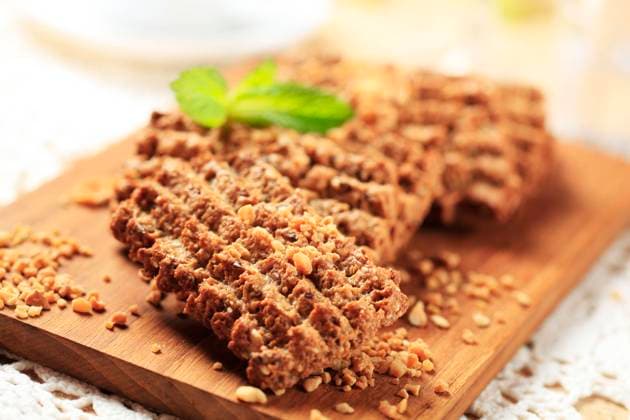 Wholegrain nutty cookies on a cutting board , 20369062.jpg, teatime, crisp, treacle, seeds, oat, nobody, closeup, baked, food, cutting board, nutritious, healthy, morsel, treat, dessert, snack, breakfast, sweet, crispy, brown sugar, golden syrup, whole grain, chopped, nuts, cereal, rolled oats, nutty, flapjacks, biscuits, oatmeal, cookies,