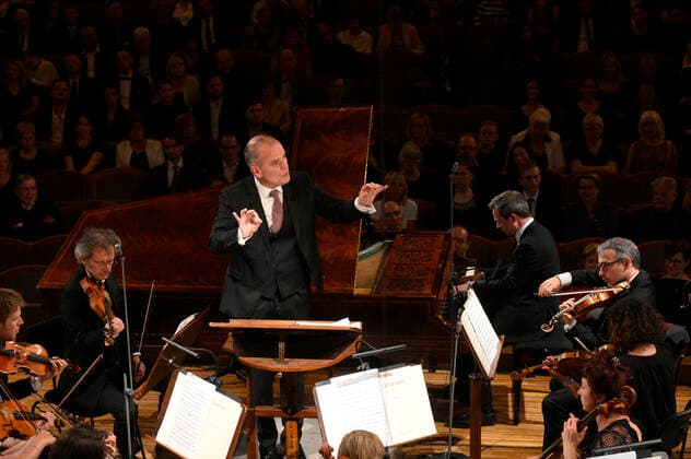 French conductor Francois-Xavier Roth, center, conducts the Les Siecles symphony orchestra during the 77th Prague Spring international music festival, on May 31, 2022, in Prague, Czech Republic. Fourth from right performs French pianist Bertrand Chamayou. (CTKxPhoto KaterinaxSulova) CTKPhotoP2022053108730  suk005