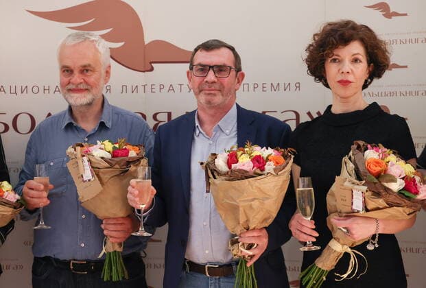 MOSCOW, RUSSIA â€“ JUNE 2, 2022: Authors Alexei Varlamov, Pavel Basinsky and Anna Matveyeva (L-R) whose novels Imya Rozanova The Name of Rozanov , Podlinnaya Istoriya Anny Kareninoi The True Story of Anna Karenina and Kazhdye Sto Let â€“ Roman S Dnevnikov A Novel With A Diary Every 100 Years respectively have been named among the 10 entries on the shortlist for Big Book Prize 2022, are pictured during the ceremony at a showroom in the GUM Shopping Arcade. The Big Book Prize is a Russian national literary prize established in 2005 to support literature professionals in Russia. Anton Novoderezhkin TASS  TS133B0A