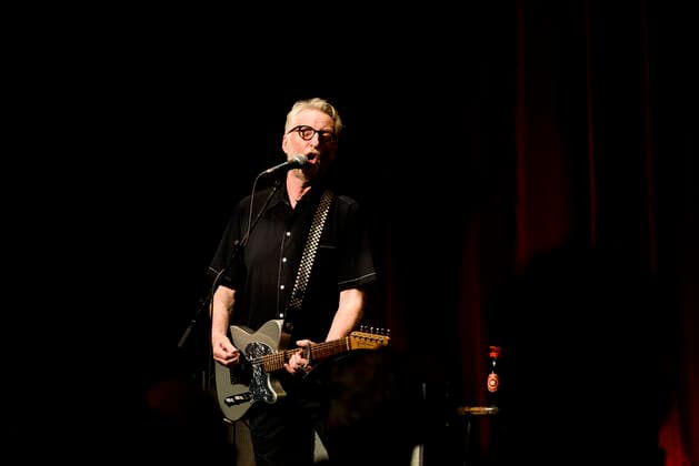 Concert of Billy Bragg in Berlin Three nights in a row Billy Bragg is at the Heimathafen Neukölln on stage and plays songs from all his creative phases On the second evening he went back to the early days and he played songs from his first three albums , Berlin Berlin Germany Neukölln