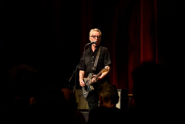 Concert of Billy Bragg in Berlin Three nights in a row Billy Bragg is at the Heimathafen Neukölln on stage and plays songs from all his creative phases On the second evening he went back to the early days and he played songs from his first three albums , Berlin Berlin Germany Neukölln