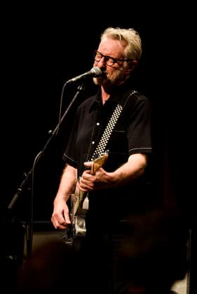 Concert of Billy Bragg in Berlin Three nights in a row Billy Bragg is at the Heimathafen Neukölln on stage and plays songs from all his creative phases On the second evening he went back to the early days and he played songs from his first three albums , Berlin Berlin Germany Neukölln