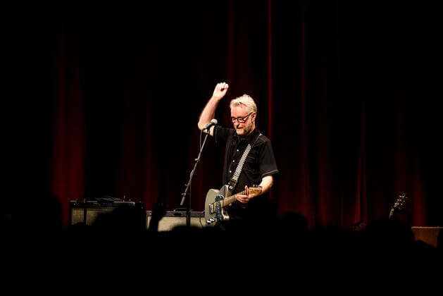 Concert of Billy Bragg in Berlin Three nights in a row Billy Bragg is at the Heimathafen Neukölln on stage and plays songs from all his creative phases On the second evening he went back to the early days and he played songs from his first three albums , Berlin Berlin Germany Neukölln