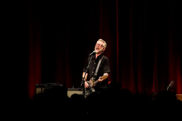 Concert of Billy Bragg in Berlin Three nights in a row Billy Bragg is at the Heimathafen Neukölln on stage and plays songs from all his creative phases On the second evening he went back to the early days and he played songs from his first three albums , Berlin Berlin Germany Neukölln