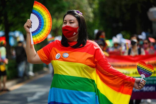 June 5, 2022, Bangkok, Thailand: A demonstrator seen wearing a rainbow costume during the pride parade in Bangkok. Various groups of demonstrators gathered at Silom road for the pride parade rally, dressed in colorful costumes and demanding for gender issues such as gender equality, gender rights on LGBTQs, sex worker rights, same sex marriage, etc. Bangkok Thailand - ZUMAs197 20220605_zaa_s197_069 Copyright: xVaruthxPongsapipattx