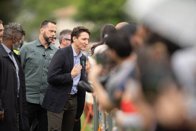 June 5, 2022, London, ON, Canada: Prime Minister Justin Trudeau greets people as he arrives for a ceremony and march in memory of the Afzaal family in London, Ont. on Sunday June 5, 2022. London Canada  - ZUMAc35_ 20220605_zaf_c35_026 Copyright: xGeoffxRobinsx