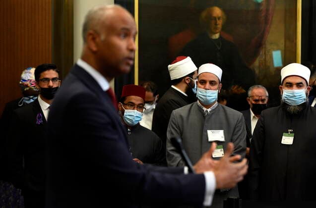 June 6, 2022, Ottawa, ON, CAN: Imam Refaat Mohamed, President of the Canadian Council of Imams, centre, listens as Minister of Housing and Diversity and Inclusion Ahmed Hussen speaks during a news conference on the governmentöÄÃ s work to combat Islamophobia, on the one-year anniversary of the vehicle attack on the Afzaal family in London, Ont., in the foyer of the House of Commons in Ottawa, on Monday, June 6, 2022. Ottawa CAN - ZUMAc35_ 20220606_zaf_c35_029 Copyright: xJustinxTangx