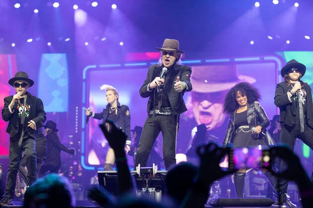 Singer, musician Udo LINDENBERG mi with singer Ina Deine Cousine BREDEHORN li and singer Nathalie DORRA r and choir Kids on Stage, at his concert in the L A N X E S S A R E N A in Cologne, on 10 06 2022,