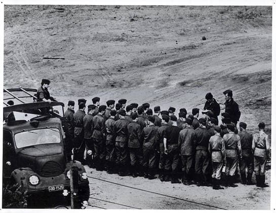 October 1961 - Young Soldiers, Most of Them In Their Teens, Line Up for Roll Call Before Commencing Their Day s Work Clearing Death Strip 1062_05_M_-12873-