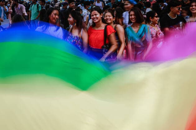 June 11, 2022, Kathmandu, Bagmati, Nepal: Members of LGBTQIA+ communities waves the rainbow flag during Fourth Annual Nepal Pride Parade,Kathmandu. The rainbow flag is a symbol of lesbian, gay, bisexual, transgender (LGBT) and queer pride and LGBT social movements. Kathmandu Nepal - ZUMAm204 20220611_zip_m204_007 Copyright: xAmitxMachamasix