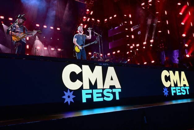 11 June 2022 - Nashville, Tennessee - T.J. Osborne and John Osborne, Brothers Osborne. 2022 CMA Fest Nightly Concert Day Three held at Nissan Stadium. USA - ZUMAa123 20220611_zaa_a123_437 Copyright: xAdMediax