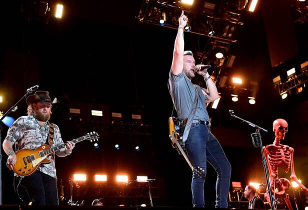11 June 2022 - Nashville, Tennessee - T.J. Osborne and John Osborne, Brothers Osborne. 2022 CMA Fest Nightly Concert Day Three held at Nissan Stadium. USA - ZUMAa123 20220611_zaa_a123_423 Copyright: xAdMediax