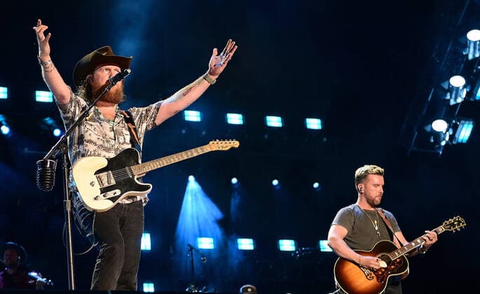 11 June 2022 - Nashville, Tennessee - T.J. Osborne and John Osborne, Brothers Osborne. 2022 CMA Fest Nightly Concert Day Three held at Nissan Stadium. USA - ZUMAa123 20220611_zaa_a123_420 Copyright: xAdMediax