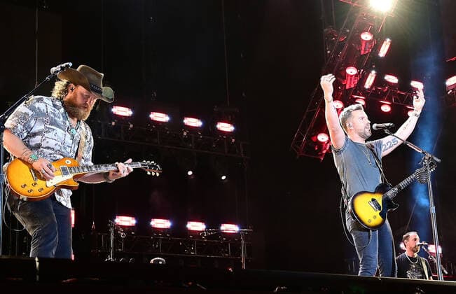 11 June 2022 - Nashville, Tennessee - T.J. Osborne and John Osborne, Brothers Osborne. 2022 CMA Fest Nightly Concert Day Three held at Nissan Stadium. USA - ZUMAa123 20220611_zaa_a123_417 Copyright: xAdMediax