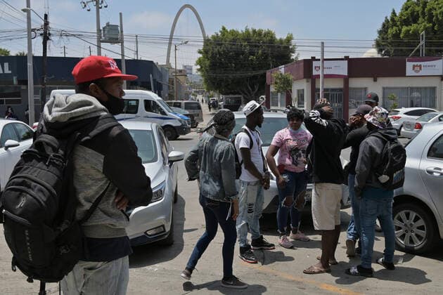 May 23, 2022, Tijuana, Baja California, Mexico: Migrants and activists at a press conference in the Espacio Migrante shelter in Tijuana, Mexico about the continuation of Title 42 (which was due to be repealed today but was not done so due to a recent decision by a Louisiana federal judge on keeping the CDC health policy intact; the case is currently being appealed by the United States government) as advocates and asylum seekers alike feel the current situation is unsustainable and leaves many with few options to make a case for asylum to the U.S. on Monday, May 23, 2022. Tijuana Mexico - ZUMAm180 20220523_zip_m180_001 Copyright: xCarlosxA.xMorenox