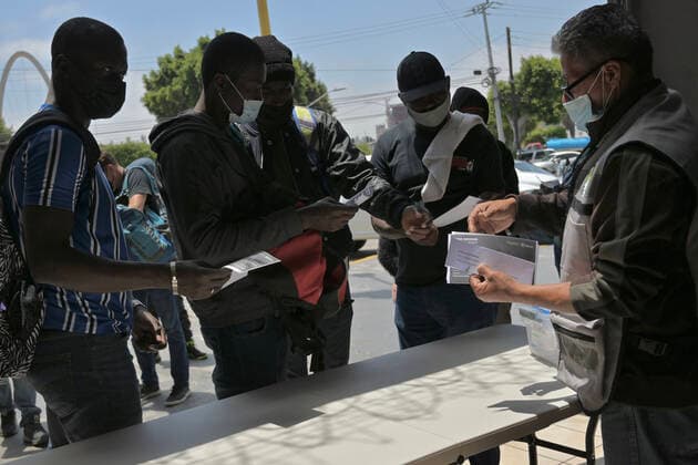 May 23, 2022, Tijuana, Baja California, Mexico: Migrants and activists at a press conference in the Espacio Migrante shelter in Tijuana, Mexico about the continuation of Title 42 (which was due to be repealed today but was not done so due to a recent decision by a Louisiana federal judge on keeping the CDC health policy intact; the case is currently being appealed by the United States government) as advocates and asylum seekers alike feel the current situation is unsustainable and leaves many with few options to make a case for asylum to the U.S. on Monday, May 23, 2022. Tijuana Mexico - ZUMAm180 20220523_zip_m180_008 Copyright: xCarlosxA.xMorenox