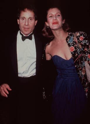 Paul Simon and Carrie Fisher Los Angeles.CA.USA. LIBRARY. Paul Simon and Carrie Fisher. Circa July 1983. LMK30-SLIB130622PBOR-001 