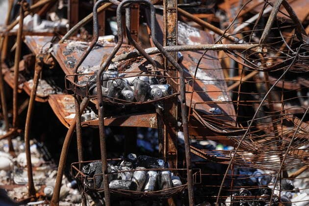 June 14, 2022, LYTTON, BC, CANADA: Beverage cans and shelving are seen inside a grocery and liquor store that was destroyed by wildfire, in Lytton, B.C., on Tuesday, June 14, 2022. The fire-ravaged community of Lytton, B.C., will get $77 million from the federal government to help it rebuild a fire-resistant and energy-efficient community. Two people were killed and much of the centre of the village was destroyed when wildfire ripped through the community almost a year ago. LYTTON CANADA  - ZUMAc35_ 20220614_zaf_c35_090 Copyright: xDarrylxDyckx