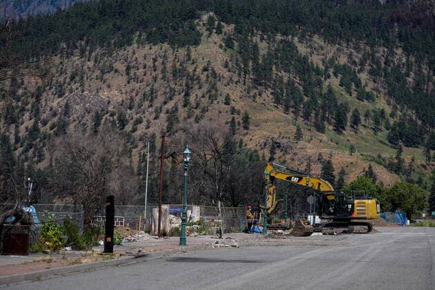 June 14, 2022, LYTTON, BC, CANADA: Heavy equipment is seen parked on a street in Lytton, B.C., on Tuesday, June 14, 2022. The fire-ravaged community of Lytton, B.C., will get $77 million from the federal government to help it rebuild a fire-resistant and energy-efficient community. Two people were killed and much of the centre of the village was destroyed when wildfire ripped through the community almost a year ago. LYTTON CANADA  - ZUMAc35_ 20220614_zaf_c35_102 Copyright: xDarrylxDyckx