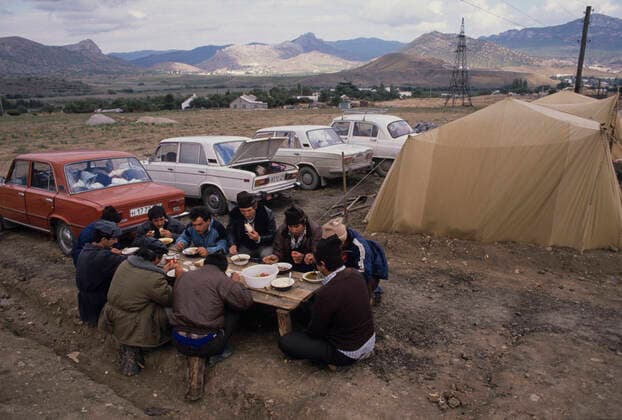 Crimean Tatars 8205055 01.09.1990 Crimean Region, Ukrainian SSR. In 1944, during the Great Patriotic War, Crimean Tatars were deported from the Crimean ASSR to Uzbekistan and neighboring regions of Kazakhstan and Tajikistan. On November 14, 1989, the USSR Supreme Soviet adopted a declaration restoring the deported ethnicities rights. Crimean Tatars started to return from deportation. Returnees have lunch on their land. Vladimir Fedorenko Republic of Crimea Russia  Copyright: xVladimirxFedorenkox