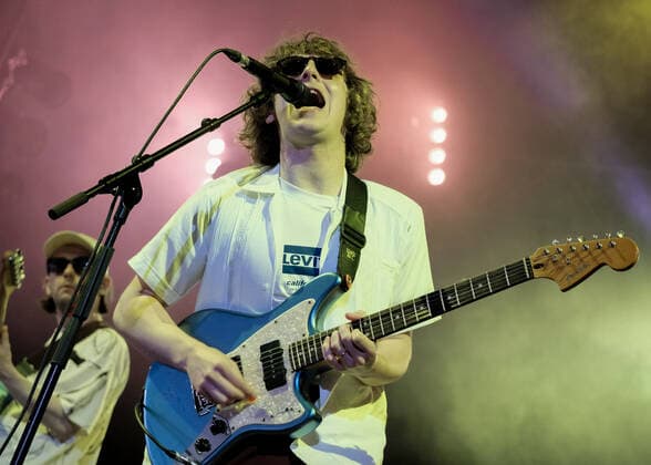 June 17, 2022, Newport, United Kingdom: Jack Cochrane, vocalist and lead guitarist with Scottish indie rock band The Snuts, who s song Always was the final number one in the Scottish Singles Chart before it was discontinued in December 2020, performing live on stage in the Big Top at the Isle of Wight Festival. Newport United Kingdom - ZUMAs197 20220617_zaa_s197_250 Copyright: xDawnxFletcher-Parkx