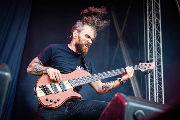 Jinjer live at Copenhell 2022, Copenhagen, Denmark Copenhagen, Denmark. 18th, June 2022. The Ukrainian heavy metal band Jinjer performs a live concert during the Danish heavy metal festival Copenhell 2022. Here bass player Eugene Abdukhanov is seen live on stage. Copenhagen Denmark  Copyright: xGonzalesxPhoto SebastianxDammarkx