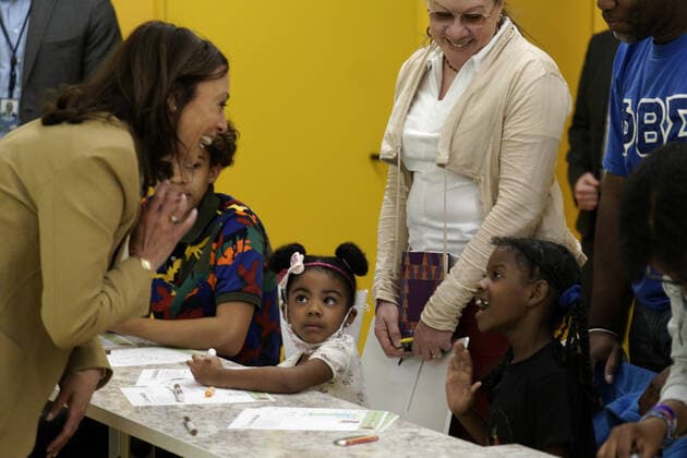U.S. Vice President Kamala Harris greets children at an art class as she visits the National Museum of African American History and Culture to mark a Juneteenth in Washington, DC on Monday, June 20, 2022.  WASP20220620101 YurixGripas