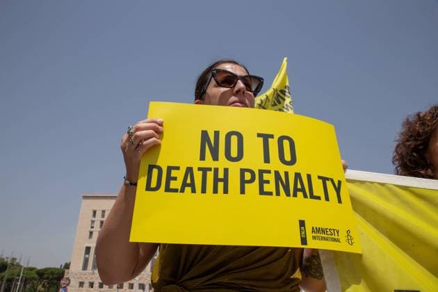 Italy: Protest against death sentences in Myanmar Amnesty International activists in front of Foreign Ministry in Rome protest against four death sentences announced by military authorities of Myanmar. Roma RM Italy Copyright: MatteoxNardone