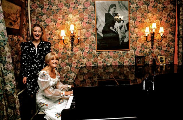 Actress L.Maksakova and her daughter Masha 369578 22.02.1999 Actress of Vakhtangov Theatre of Lyudmila Maksakova and her daughter Masha in private. On the wall is a portrait of Maria Maksakova , a great Russian singer, the actress mother. Vladimir Vyatkin Sputnik Moscow Russia  Copyright: xVladimirxVyatkinx