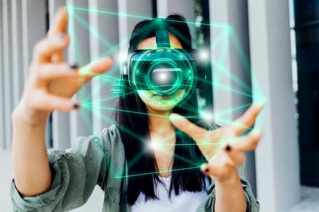 Creative Highlights Symbolbilder Woman wearing VR simulator using transparent interface model released, Symbolfoto, MEUF05980