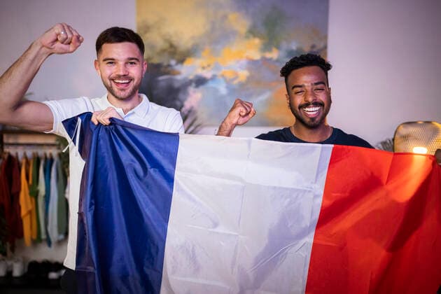 Happy young men with French flag cheering at home model released, Symbolfoto property released, Florence Florence Italy SBAF00152